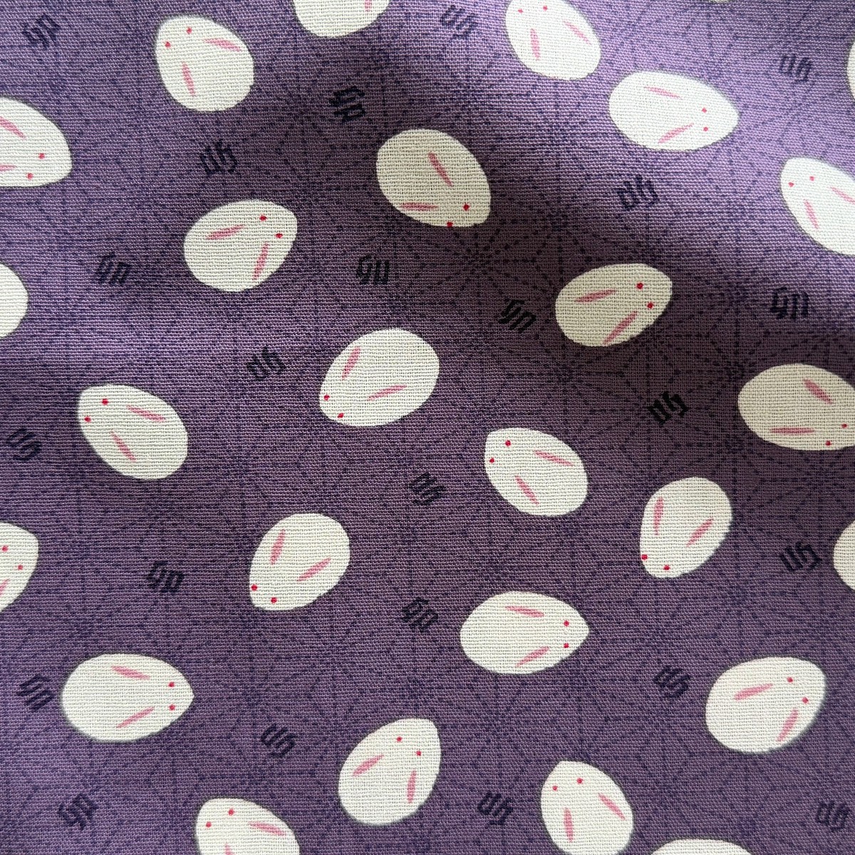 Slipper Bunnies on Lavender Quilting Cotton (Made in Japan)