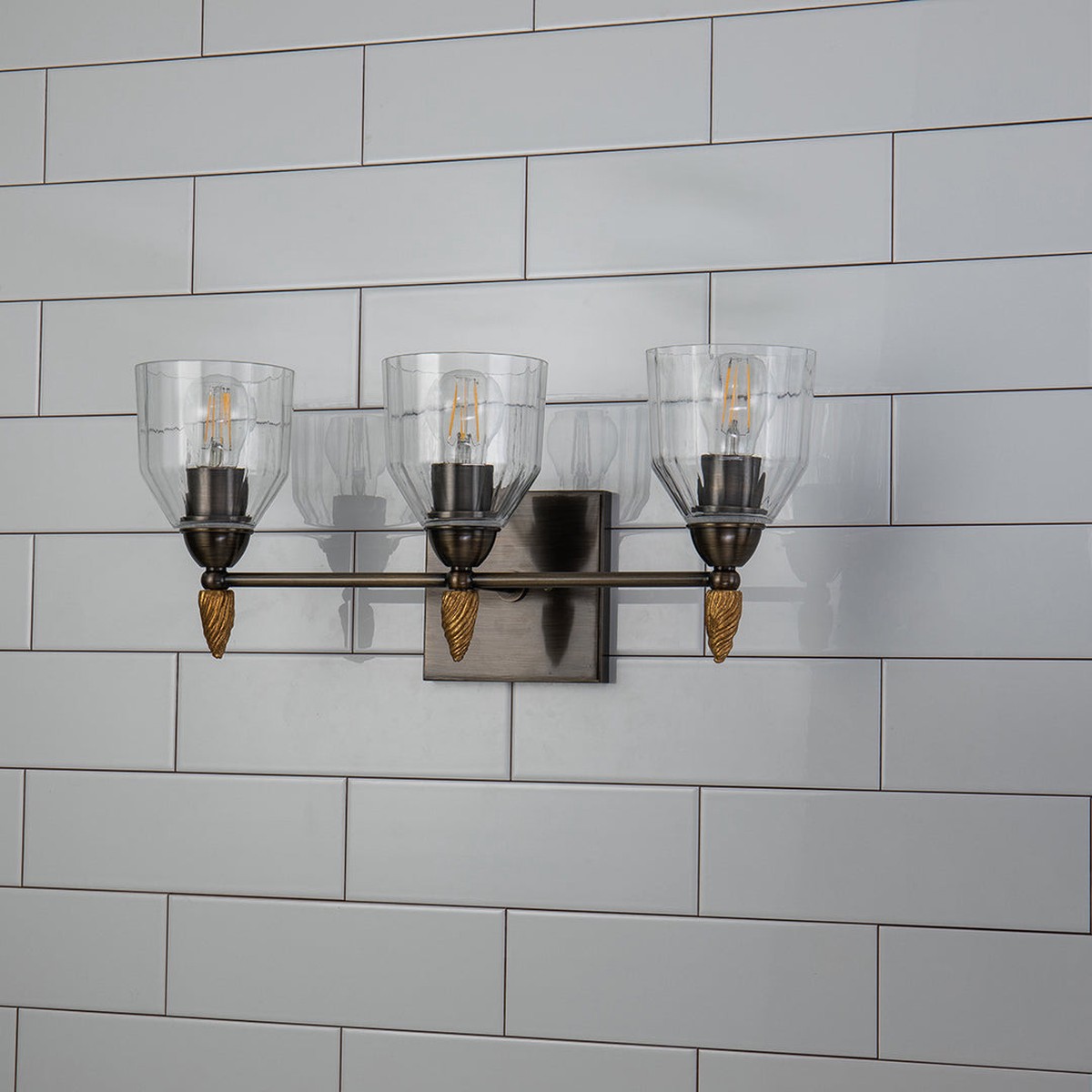 Lucas + McKearn Felice 3 Light Bath Bar in Dark Bronze with Gold Accents and Clear Glass Shades